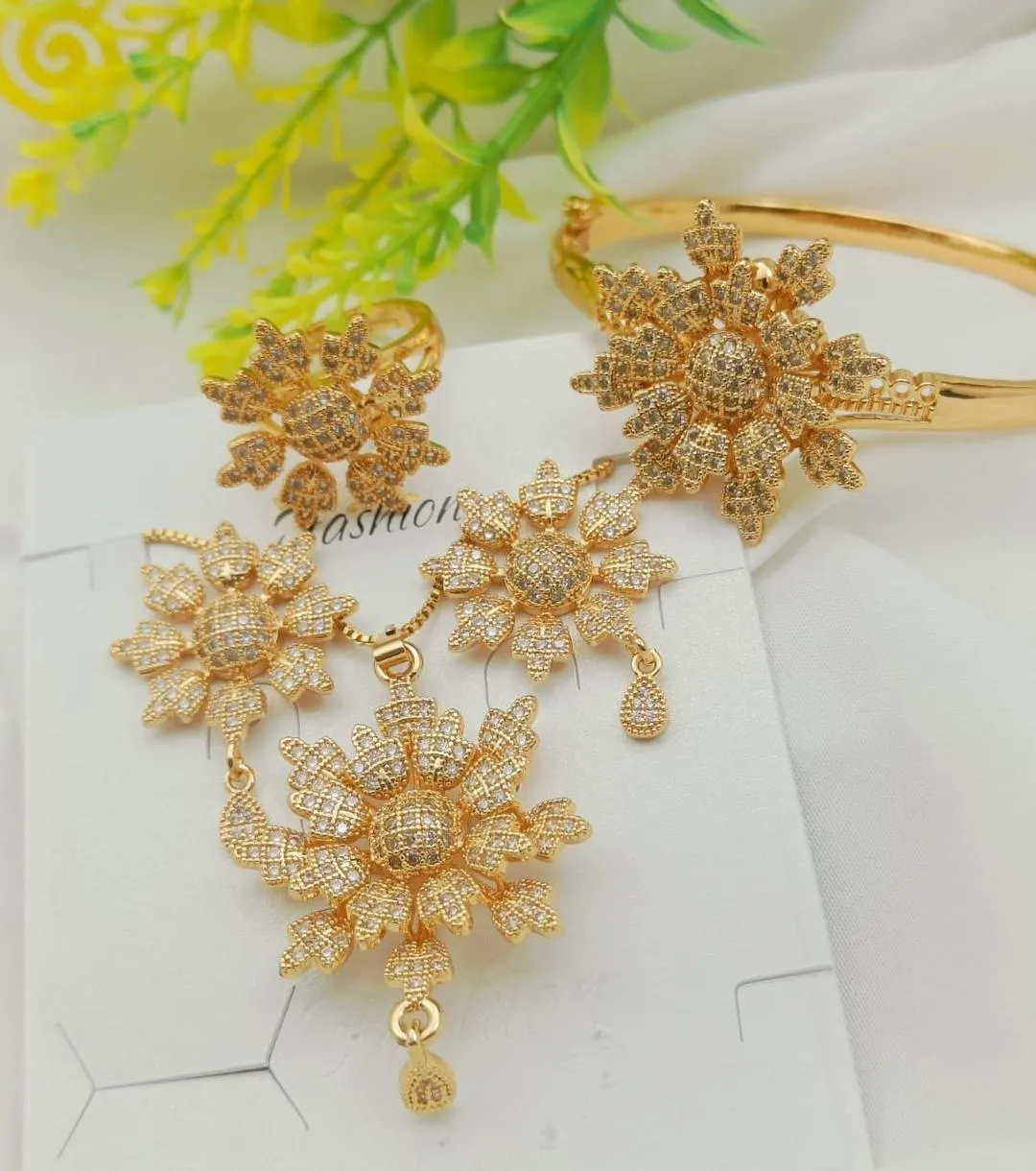 1779 41 688347 product 1 (1) Golden Flower Jewelry Set for Women with Zarcoon Stones in Golden and Silver
